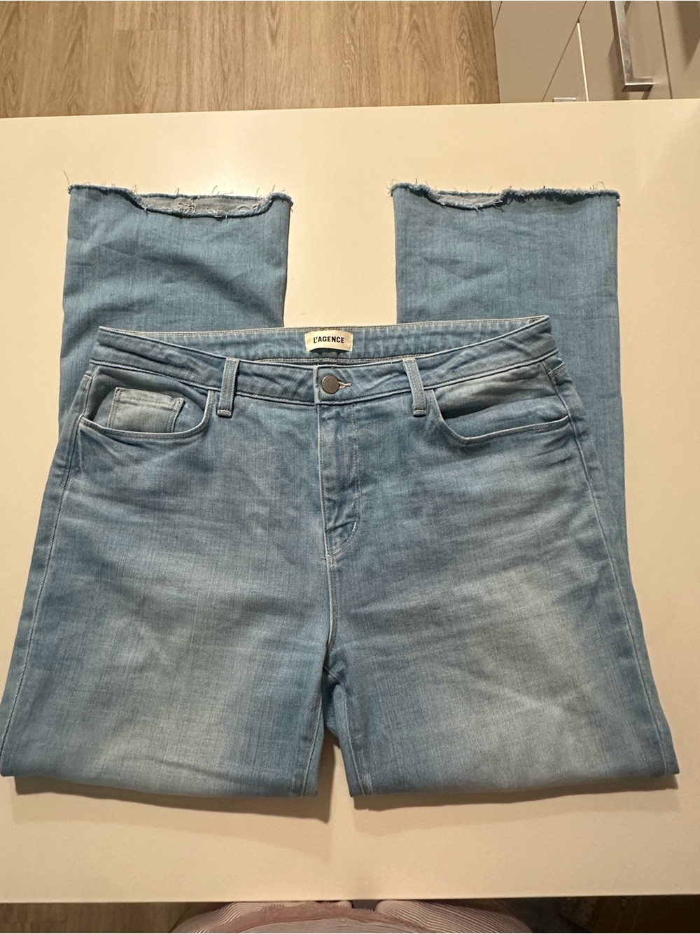 L'AGENCE Light Wash Straight Leg Jeans with Frayed Hem